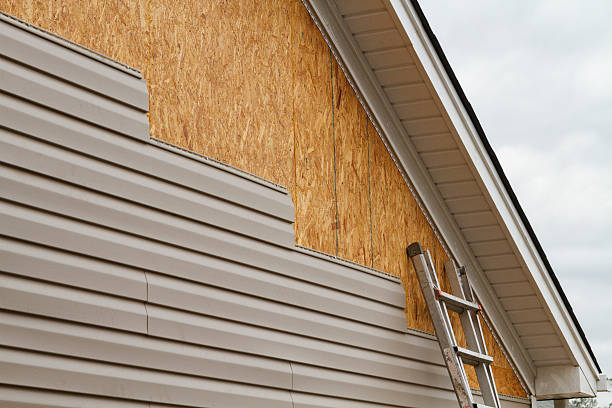 Professional Siding Contractor technician working in Euless, TX
